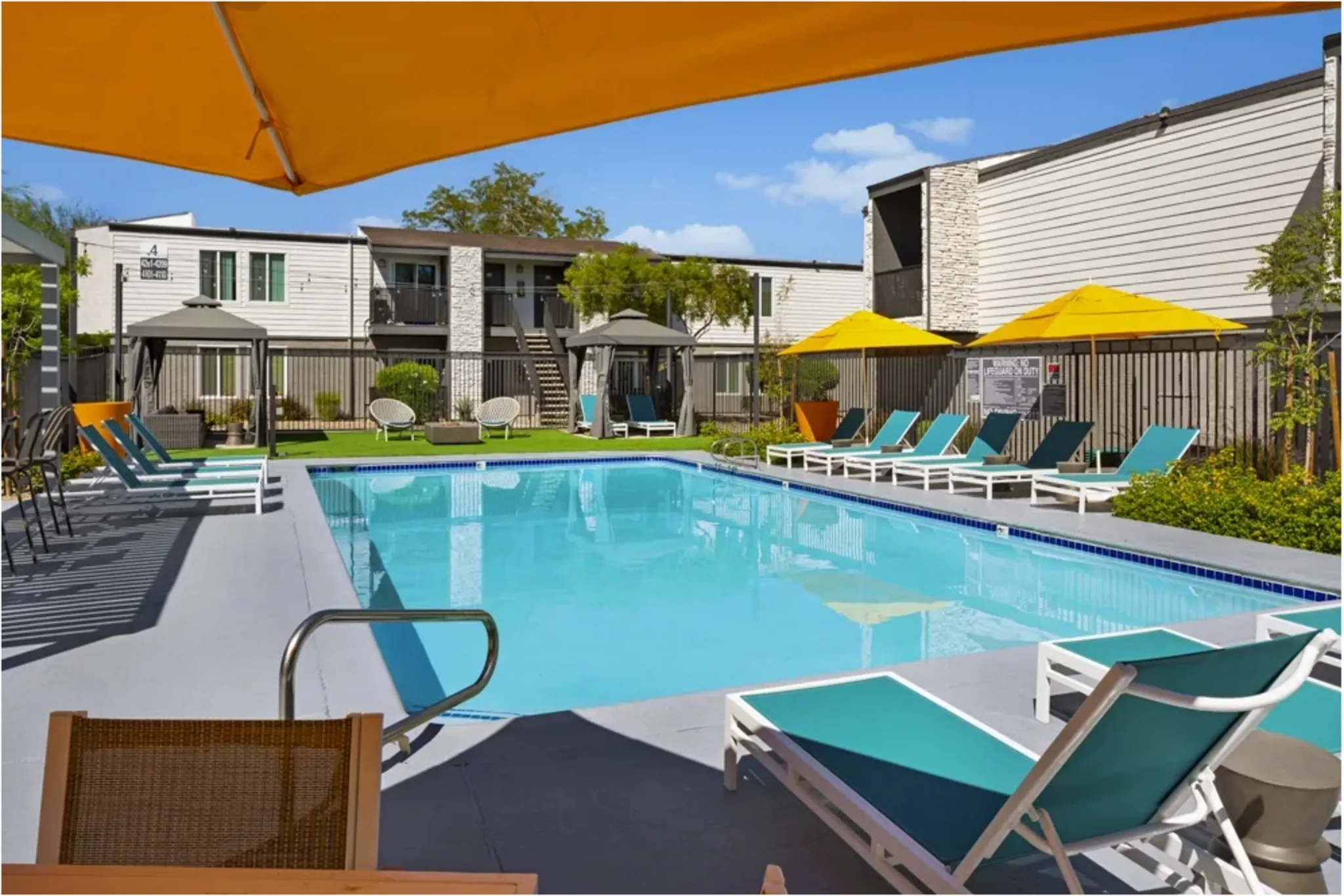 Resident pool and shaded terrace at SITE Fifty55, Las Vegas, NV